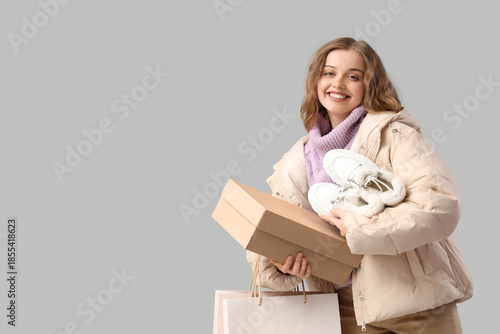 Stylish young woman with wi...