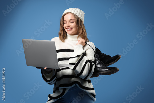 Stylish young woman with la...