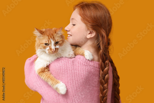 Redhead teenage girl with c...