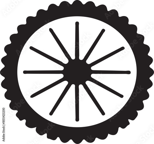Black and white of a spoked wheel with a scalloped outer edge
