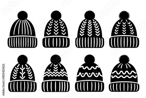 Set of eight black winter beanie hat silhouettes and knitted cap icons with pom poms on transparent background

