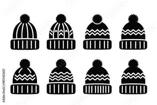 Set of eight black winter beanie hat silhouettes and knitted cap icons with pom poms on transparent background

