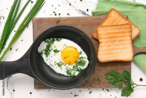 Frying pan with tasty egg, ...