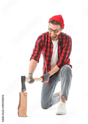 Man chopping wood with ax o...