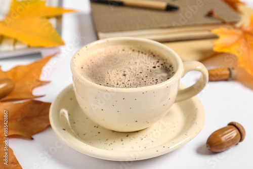 Cup of coffee with autumn l...
