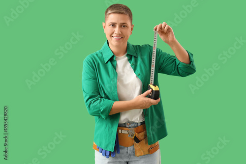 Young woman with tape measu...