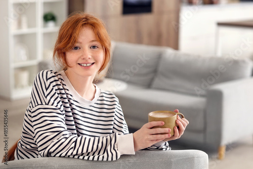 Teenage redhead girl with c...