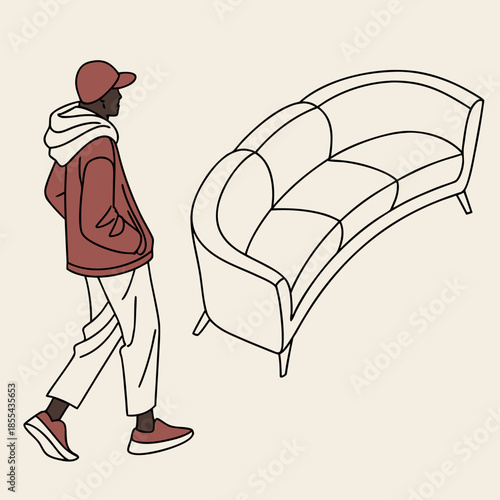 Person walking past a curved sofa