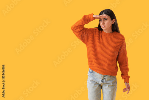 Young woman looking at some...
