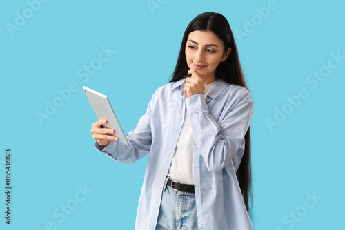 Thoughtful young woman with...