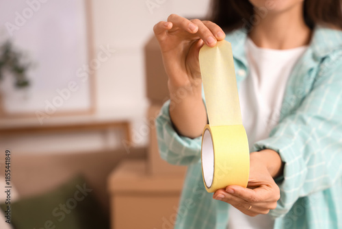 Young woman with adhesive t...
