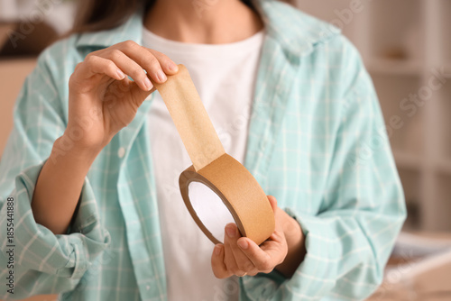 Young woman with adhesive t...
