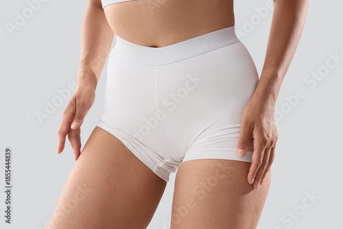 Young woman in underwear wi...