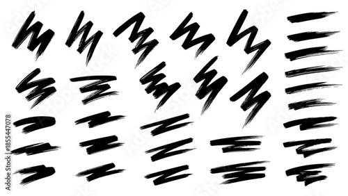 Collection of black brush strokes on white background for artistic design elements