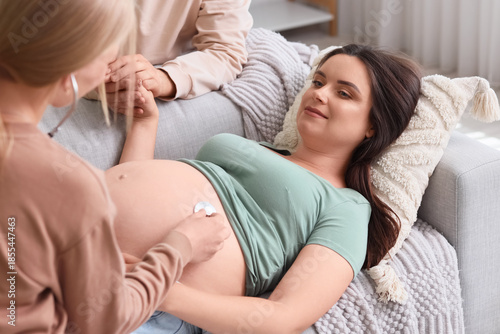 Young doula with stethoscop...