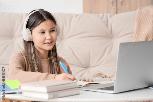Teenage girl in headphones ...