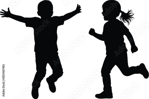 Two happy children silhouettes running and jumping together in an energetic and joyful outdoor play scene