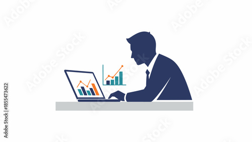Silhouette of a businessman working on a laptop with financial charts displayed.