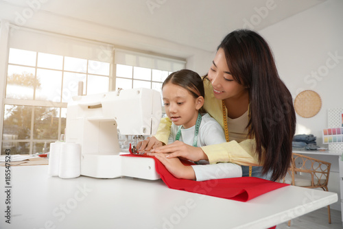 Happy Asian mother and her ...