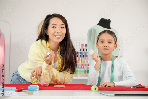 Happy Asian mother and her ...