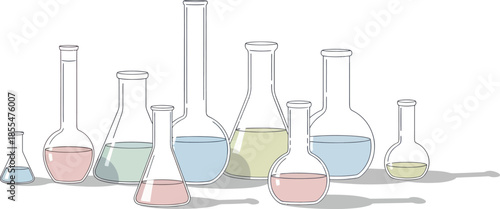 Collection of laboratory glassware including beakers and flasks filled with colorful liquids for