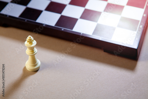 Chess board and chess pieces on the table. The concept of business success.