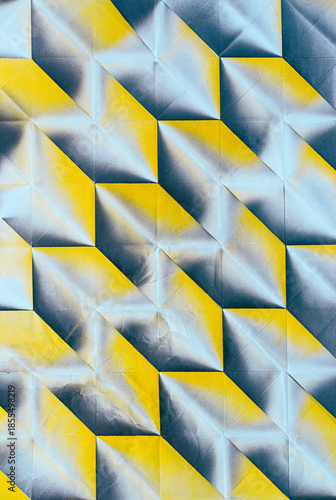Folded spray painted colorful paper art, Japanese origami background texture, abstract geometric pattern artwork