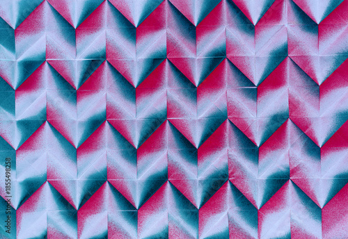 Folded spray painted colorful paper art, Japanese origami background texture, abstract geometric pattern artwork