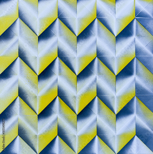 Folded spray painted colorful paper art, Japanese origami background texture, abstract geometric pattern artwork