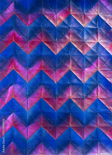 Folded spray painted colorful paper art, Japanese origami background texture, abstract geometric pattern artwork