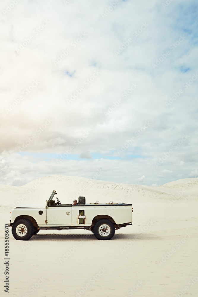 Fototapeta premium Off road truck, desert and adventure on dunes with sky, space or landscape for travel in summer. Vehicle, outdoor or drive in nature, transport or explore on all terrain trip, tourism or ride on sand