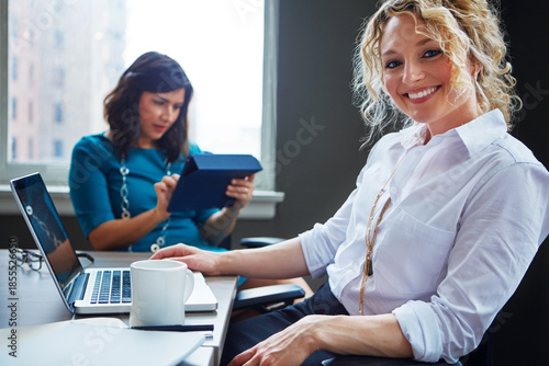 Fotografie Happy, business woman and laptop in meeting for legal research, trial preparation and filing