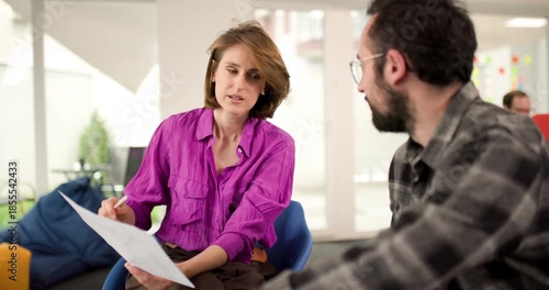 Wallpaper Mural Team members collaborate on project plans in modern office setting with focused discussions and teamwork during work hours Torontodigital.ca