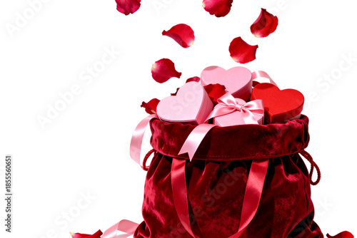 A velvet bag filled with heart-shaped gift boxes and roses petals showering down, a symbolic representation of love and romance.