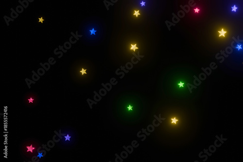 黒背景に輝くたくさんのカラフルな星