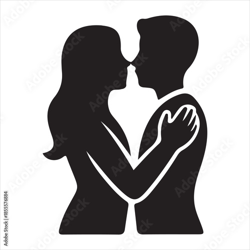 Silhouette of a romantic couple in an intimate embrace