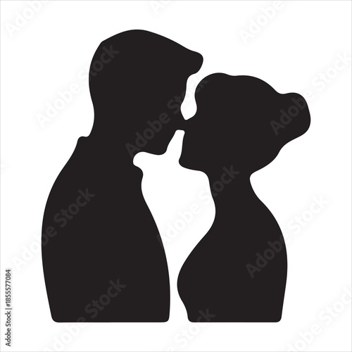 Silhouette of a romantic couple in a passionate embrace about to kiss