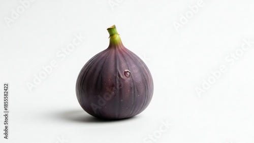 Single Purple Fig Fruit on White Background - Closeup