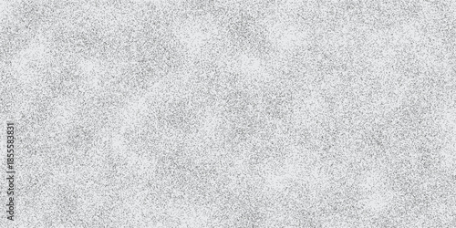 Stippled gradient texture. Fading grain dotted background. Sprayed grunge noise surface. Vector art