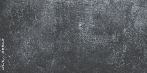A dramatic textured grayscale background showcases an intensely weathered surface with subtle light variations and imperfections
