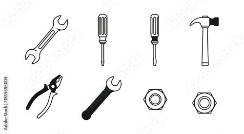 Assorted hand tools silhouetted against a black background