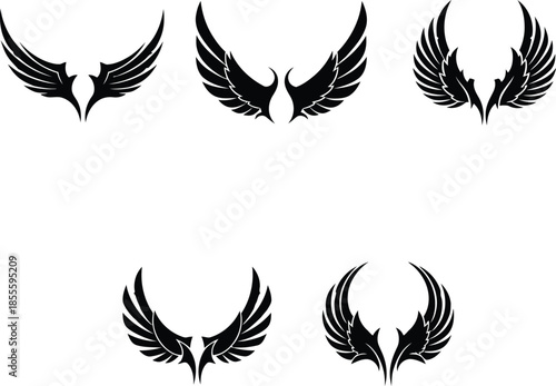 Set of black wing vector silhouettes for heraldic design tribal tattoo and bird flight conceptual graphic art elements.