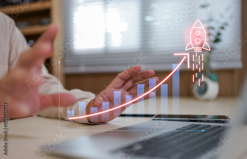 Businessman show icons about business and investment, rocket launch with arrow up percentage, Wealth fast, Graph depicting rising earning, increasing profits exemplifies financial success.