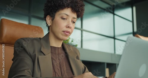 Top executive concentrating on strategic proposal in bright workspace
