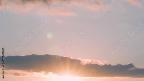 Colorful Orange Blue Skyscraper Sun and Sky at Sunset, Time Lapse. The Sun Sunlight Sun Rays Subeams Clouds and a Beautiful Sky at Sunset Timelapse. Natural Sky Sun Cloud Background Motion.