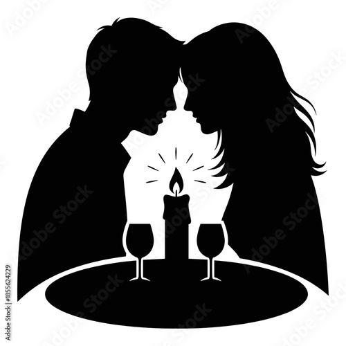 Silhouette of romantic couple sharing an intimate moment by candlelight during dinner date