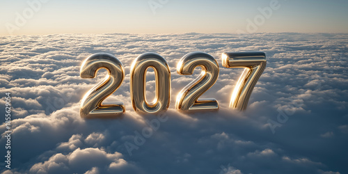 gold 2027 balloons floating above clouds