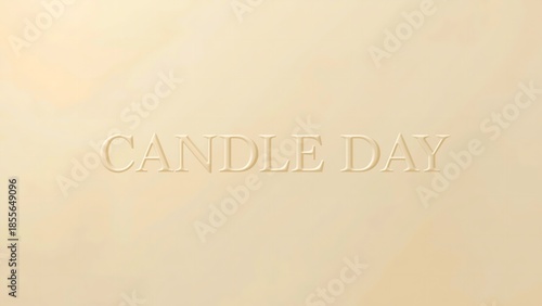 A simple beige background with the words Candle Day embossed in a light gold color