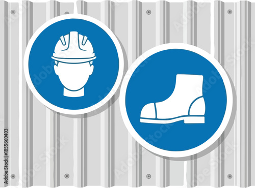 Safety First Hard Hat and Safety Boots Required Signs on Corrugated Metal Wall.