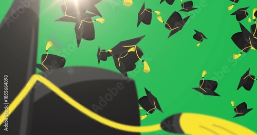 Animation of graduations hats falling against beige background